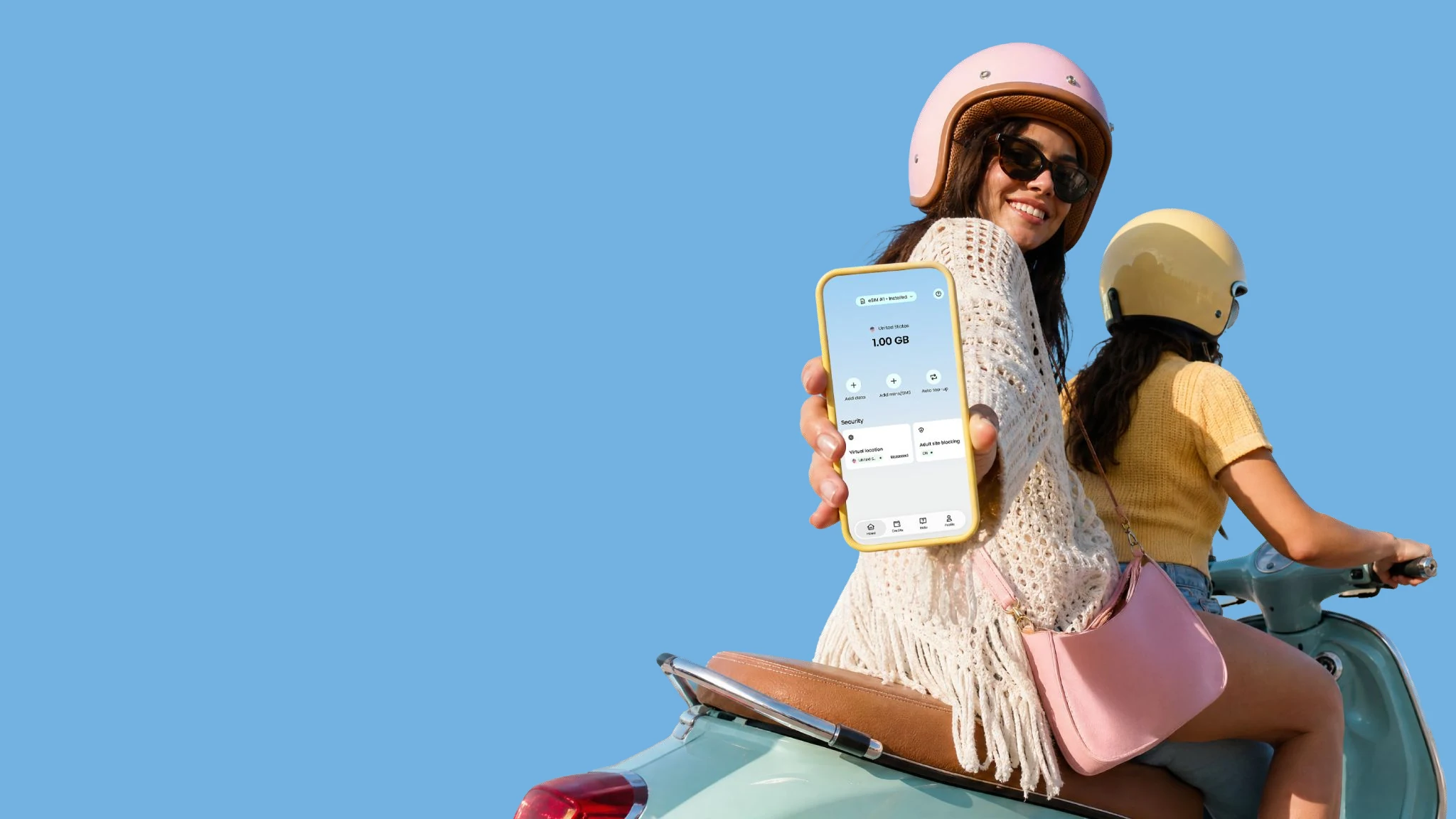 Traveler on a scooter holds an iPhone showing the Saily app data balance and security features