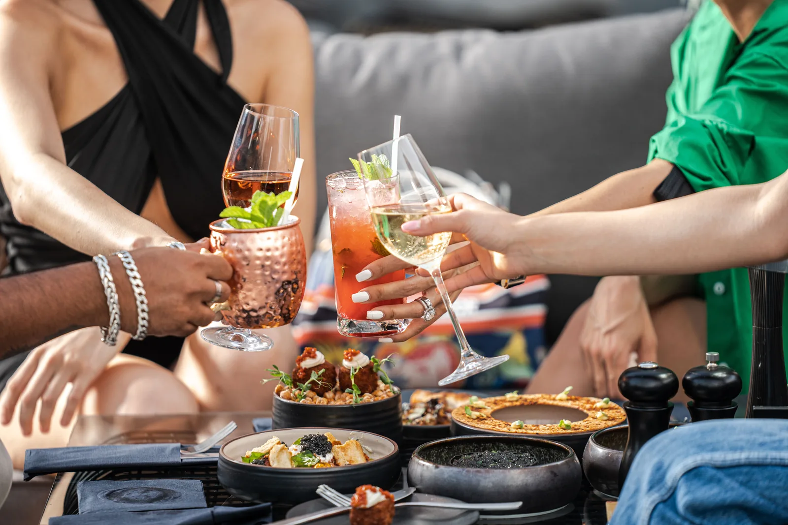 Friends toasting at a restaurant dinner