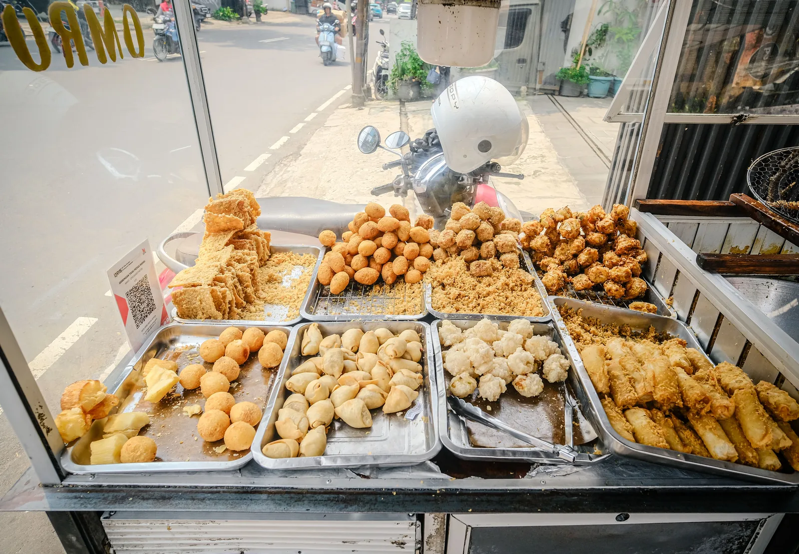 Tray display of fried Indonesian snacks