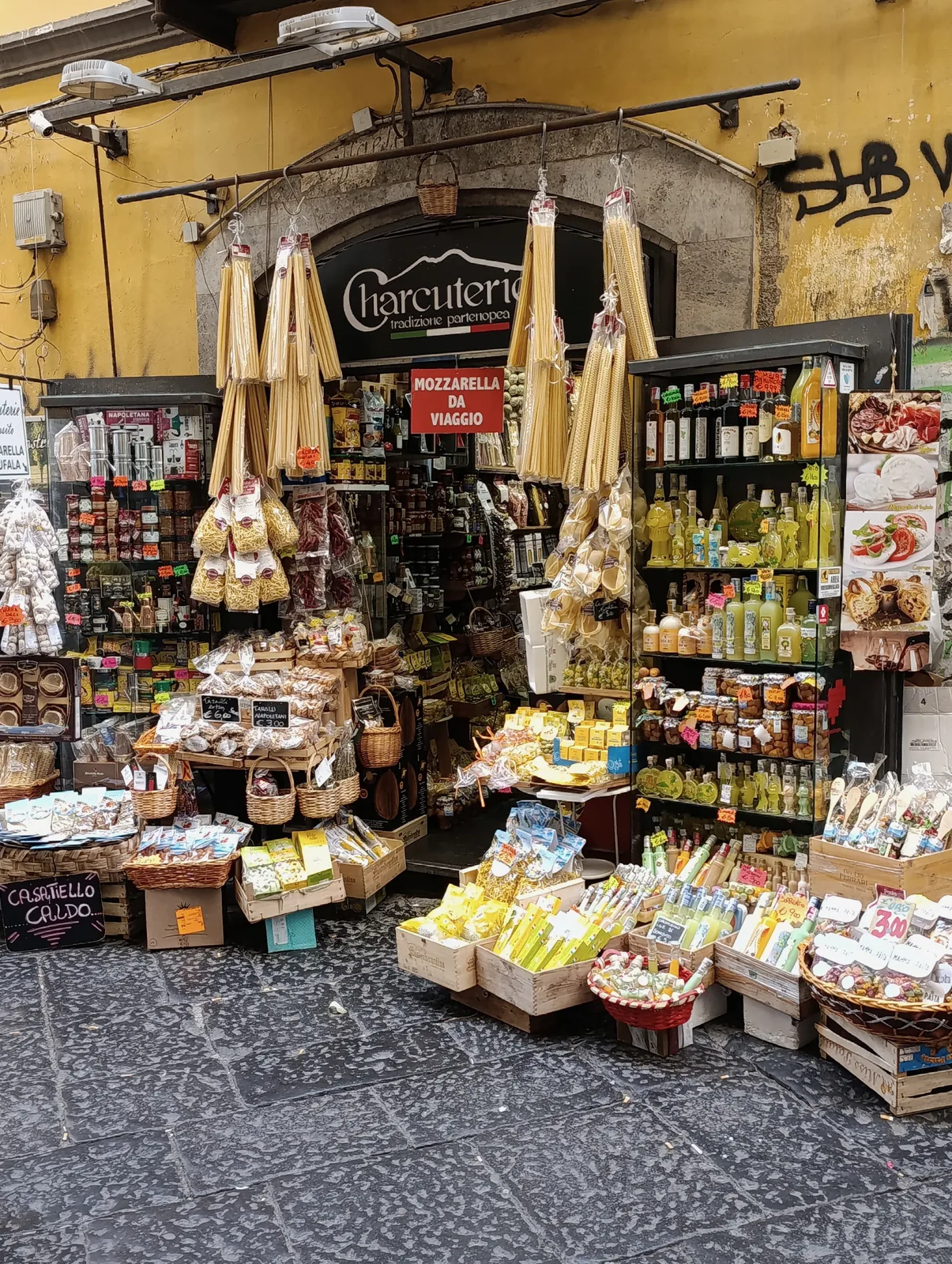 Narrow Italian alley with shopfronts