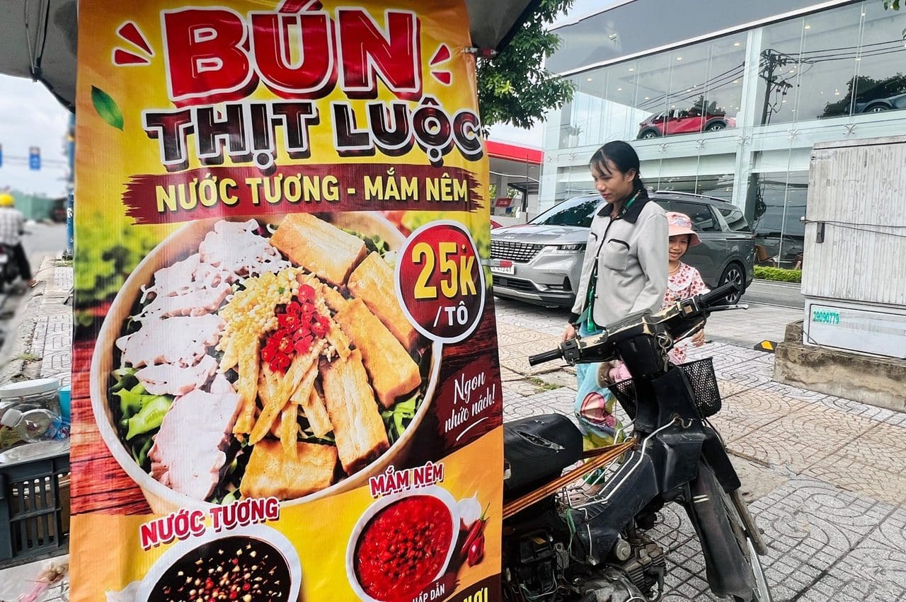 Soy sauce at a Vietnamese street food stall, nước tương contains wheat and is a primary hidden gluten source in Vietnam