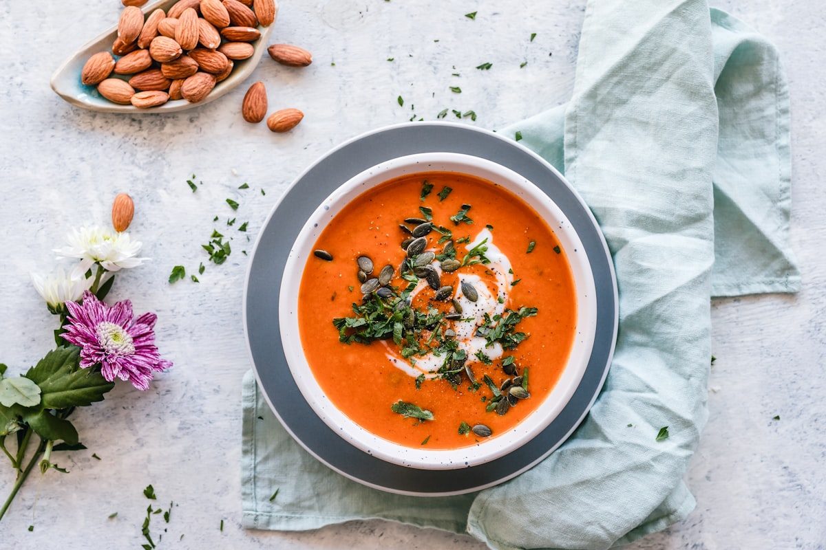 Curry soup topped with nuts