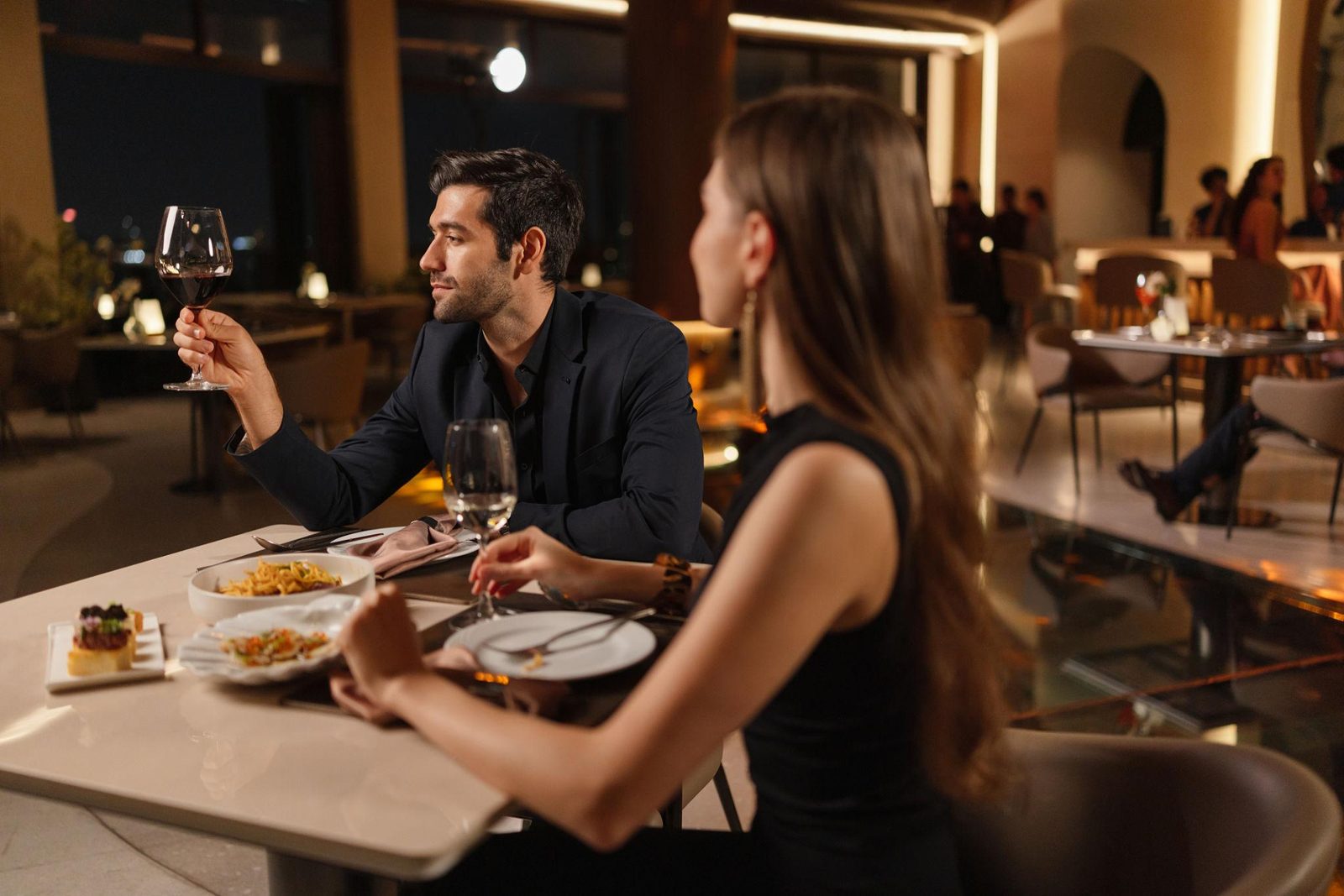 Fine dining restaurant table setting with seafood dishes in France
