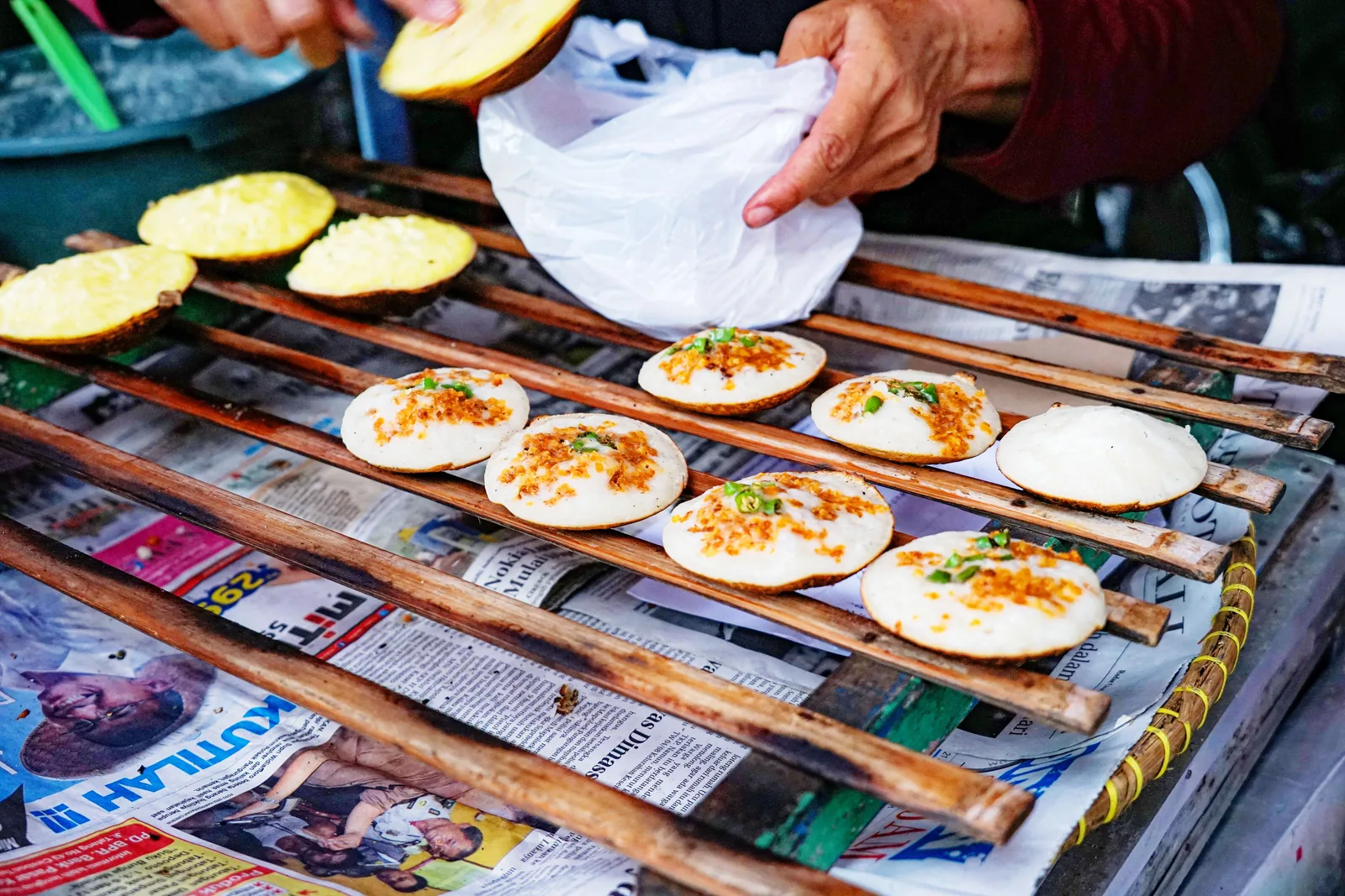 Food being served at an outdoor stall
