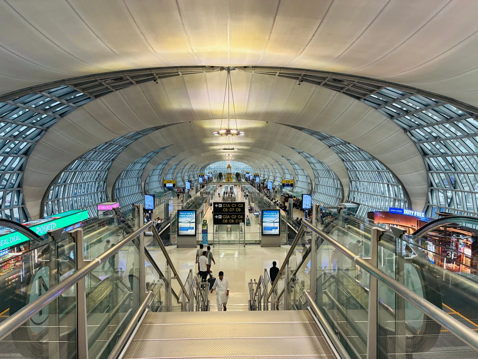 Airport terminal interior with escalators